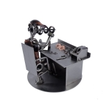 Metalowa figurka Optyk