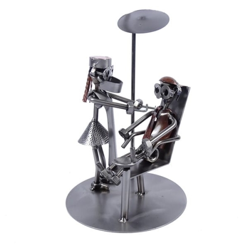 Metalowa figurka przedstawiająca Dentystkę