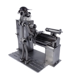 Metalowa figurka Tokarz