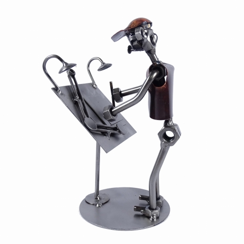 Metalowa figurka przedstawiająca Architekta