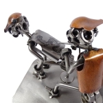 tatuaż metalowa figurka