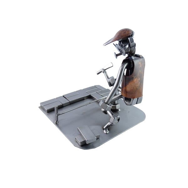 figurka Brukarza przy pracy