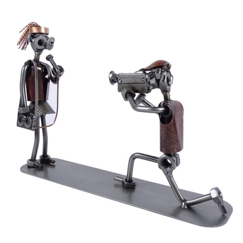 Metalowa figurka Reporter.