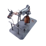 Metalowa figurka podkowal