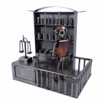 Metalowa figurka przedstawiająca pracownika apteki