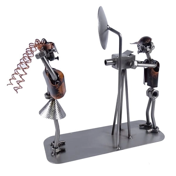 Metalowa figurka Fotograf