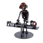 Metalowa figurka Masażysta