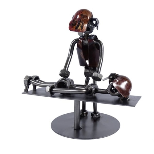 Metalowa figurka Masażysta