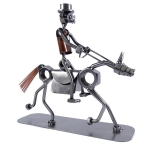 Metalowa figurka Jeździec tresujący konia