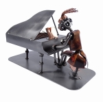Metalowa figurka Pianistka