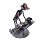 Metalowa figurka Masażysta