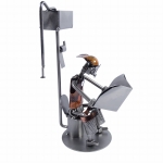 Metalowa figurka Człowiek na WC