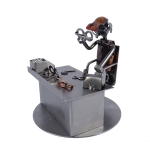 Metalowa figurka Optyk