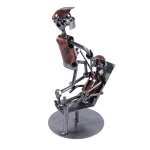 Metalowa figurka Dentysta podczas wyrywania