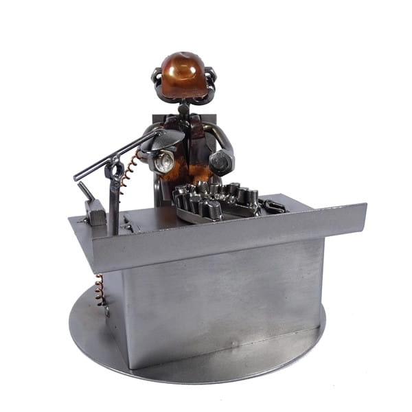 Metalowa figurka Technik dentystyczny.