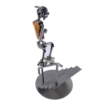 Metalowa figurka Skate na schodach