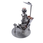 Metalowa figurka przedstawiająca Dentystkę