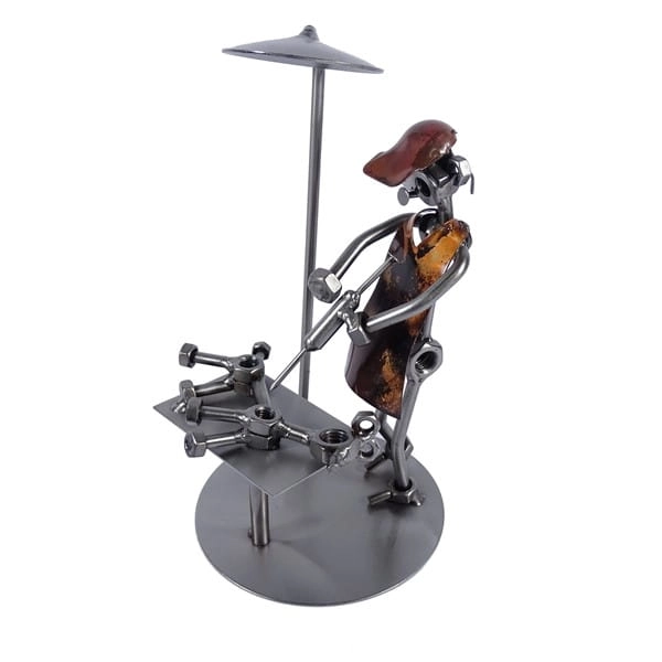 Metalowa figurka przedstawiająca Weterynarza