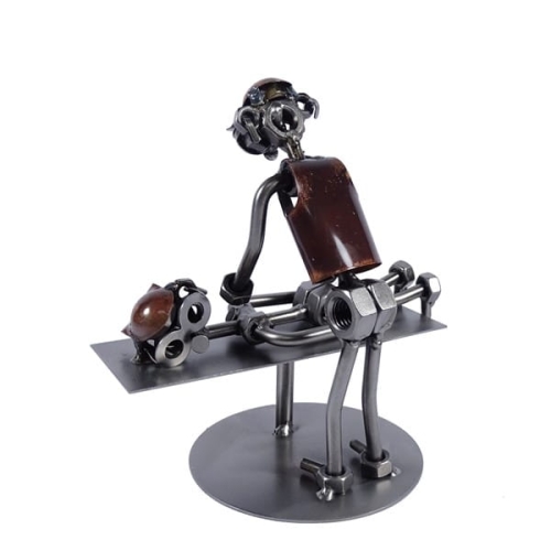 Metalowa figurka Masażysta