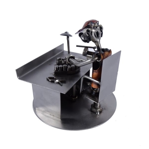 Metalowa figurka Technik dentystyczny.