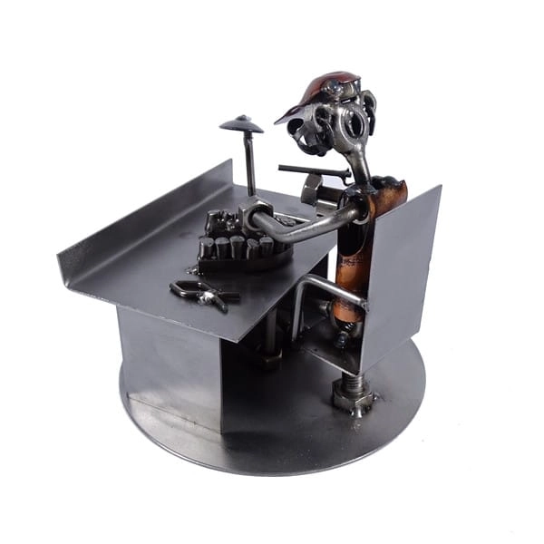 Metalowa figurka Technik dentystyczny.