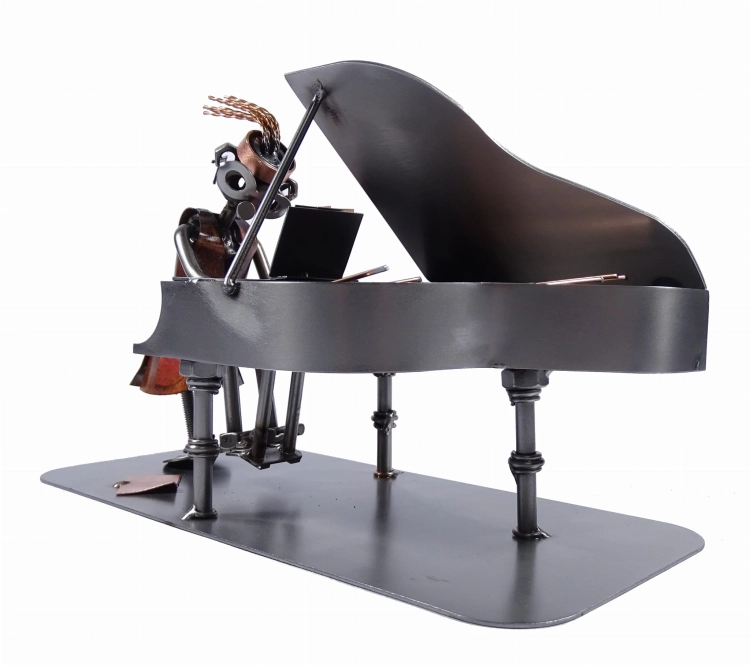 Metalowa figurka Pianistka