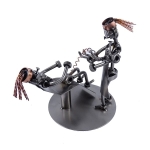 Metalowa figurka Położna