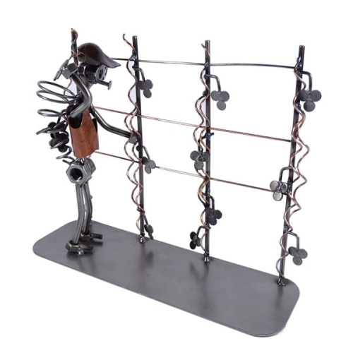 Metalowa figurka przedstawiająca zbiór winogron