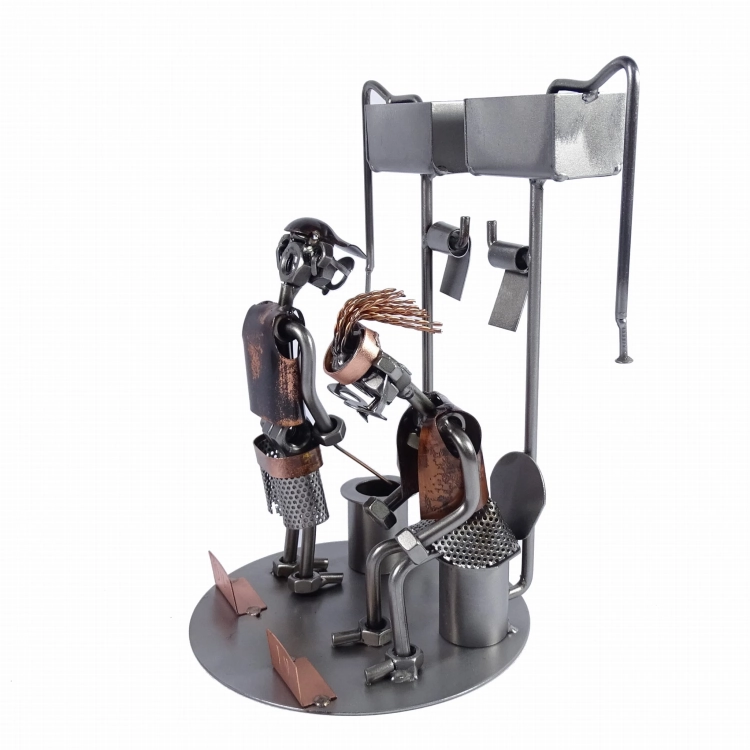 Metalowa figurka Para na WC